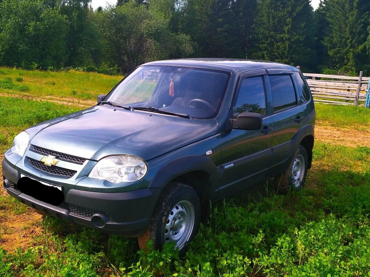 Нива шевроле цвета фото Купить б/у Chevrolet Niva I Рестайлинг 1.7 MT (80 л.с.) 4WD бензин механика в Пе