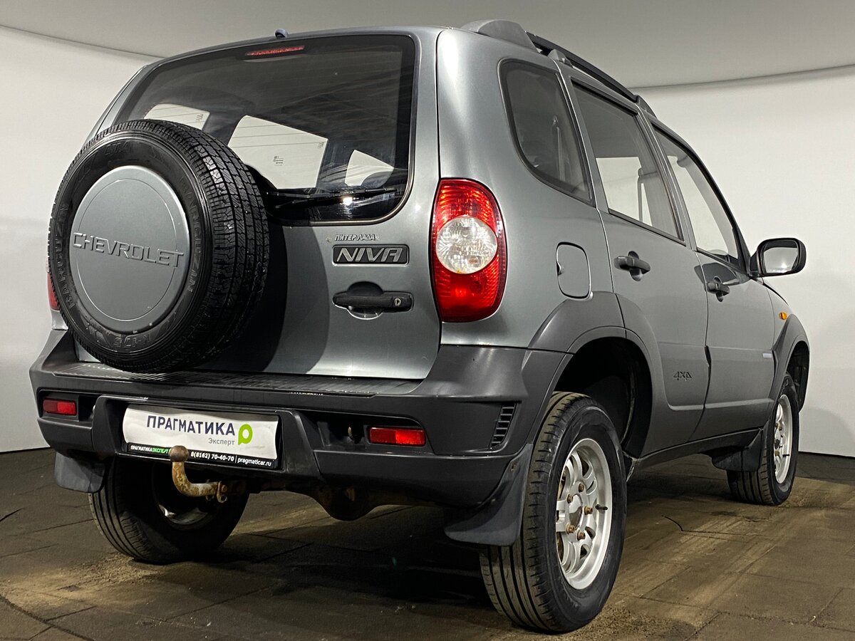 Нива шевроле вид сзади фото Купить б/у Chevrolet Niva I Рестайлинг 1.7 MT (80 л.с.) 4WD бензин механика в Ве