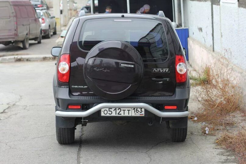 Нива шевроле вид сзади фото Защита заднего бампера под фаркоп Ø63мм Chevrolet Niva FL (Порошковое покрытие ч