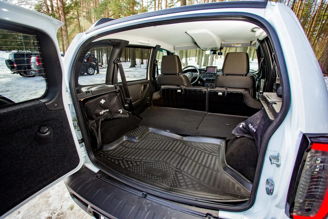 Нива тревел 2024 багажник фото Тест-драйв Lada Niva Travel, Haval H5 и УАЗ Патриот: что купить вместо нового Re