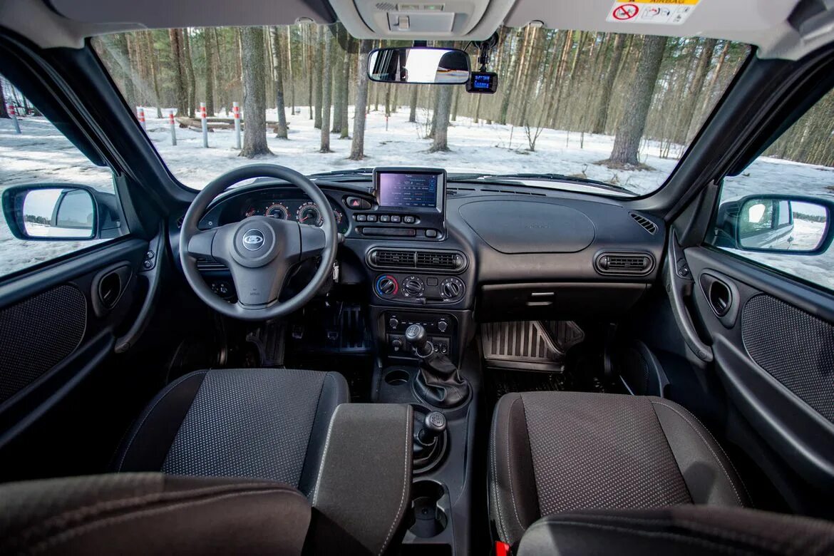 Нива тревел фото салона Тест-драйв Lada Niva Travel, Haval H5 и УАЗ Патриот: что купить вместо нового Re