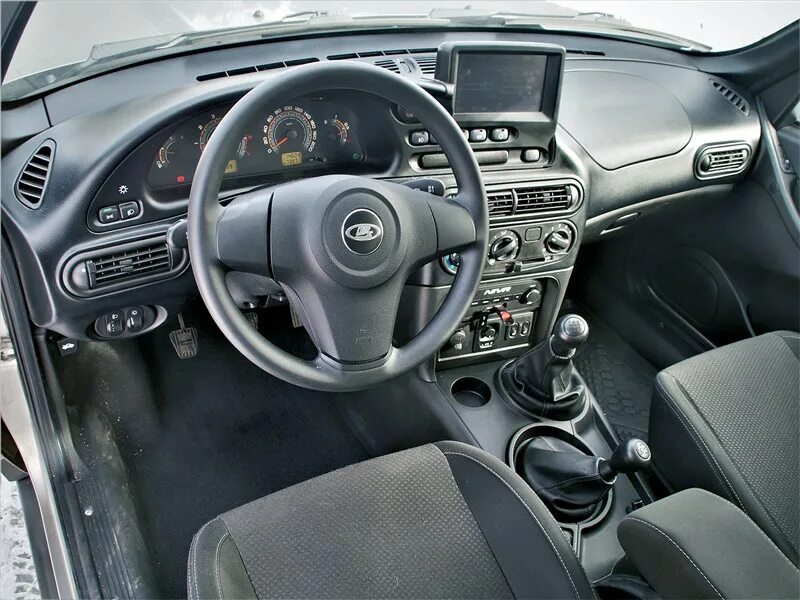 Нива тревел фото внутри Фото Lada Niva Travel - Стиль оформления приборной панели заимствован у более со