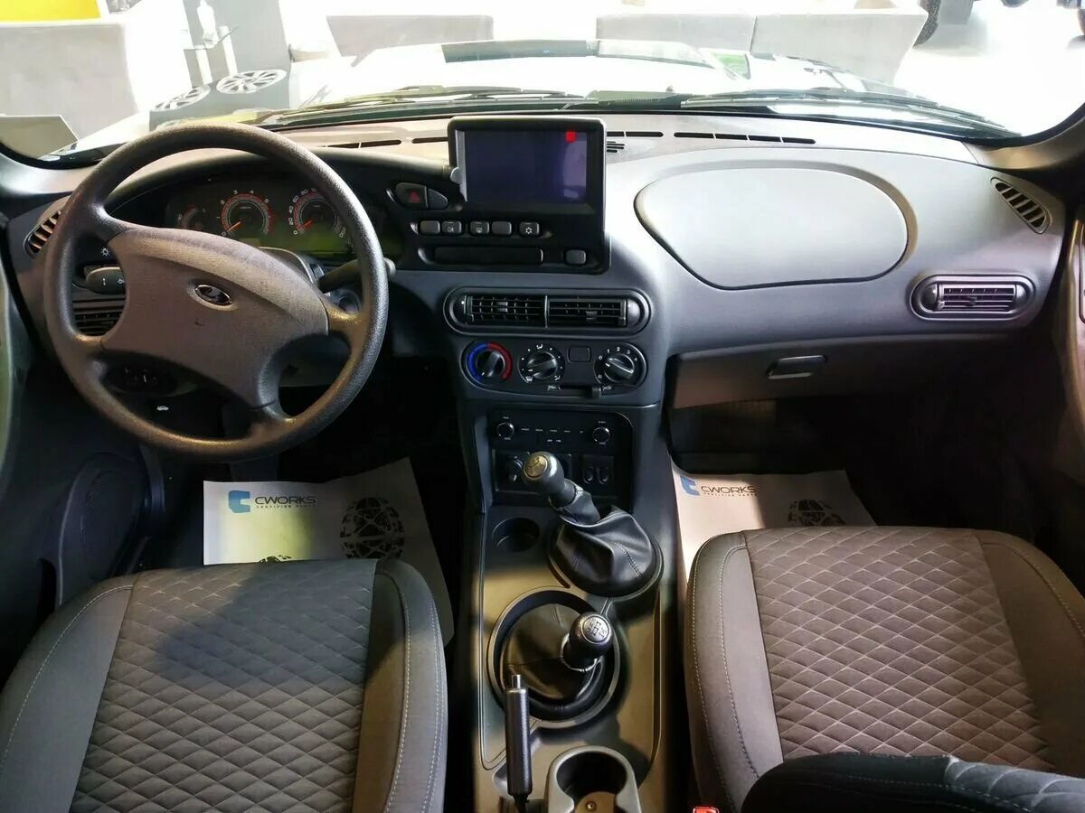 Нива тревел комфорт фото салона Купить новый Lada (ВАЗ) Niva I Рестайлинг (Travel) 1.7 MT (80 л.с.) 4WD бензин м