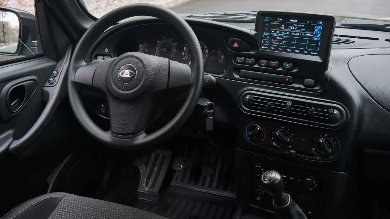 Нива тревел комфорт фото салона Lada Niva Off-road - Купить новую Ладу Нива Офф роуд в кредит - цены 2021-2022 г