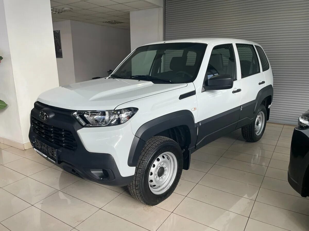 Нива тревел купить новая фото Купить новый Lada (ВАЗ) Niva I Рестайлинг (Travel) 1.7 MT (80 л.с.) 4WD бензин м