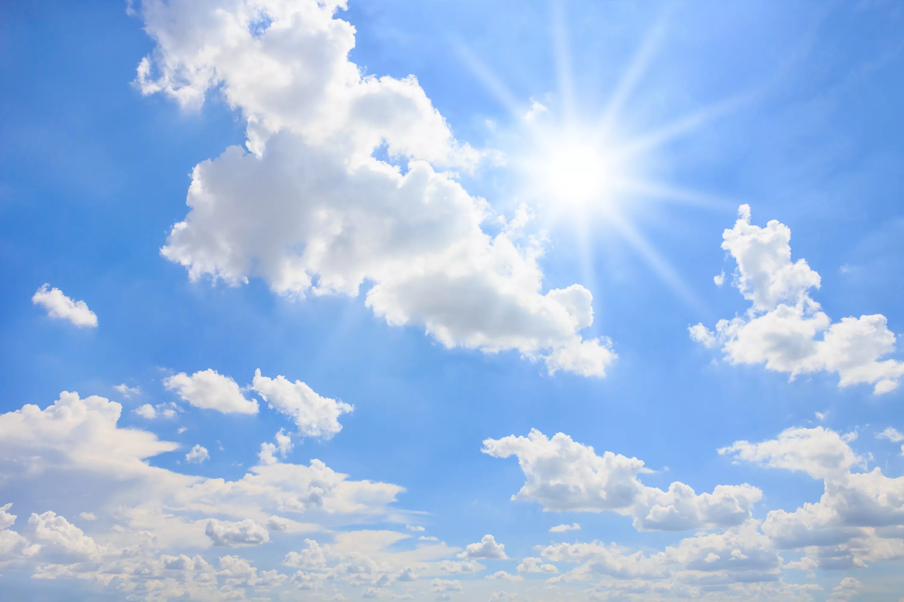 Нижнее небо фото Bright sun in the blue sky with white clouds Desktop wallpapers 1024x1024
