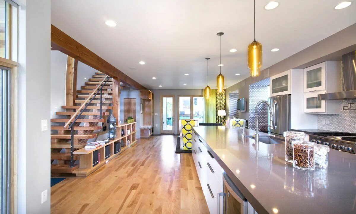 Освещение дома внутри фото Denver House Features Pharos Pendant Lights over Kitchen Island Kitchen island l