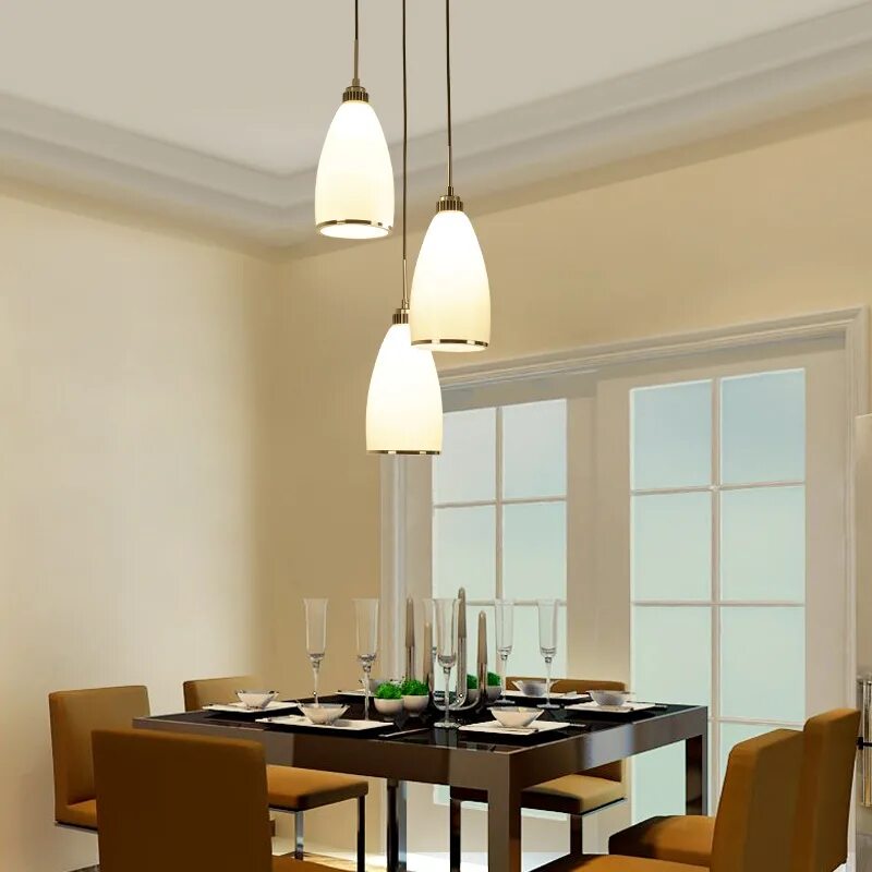 Освещение над кухонным столом фото White Glass Bell Pendulum Light Nordic 3-Light White Ceiling Pendant in Chrome f