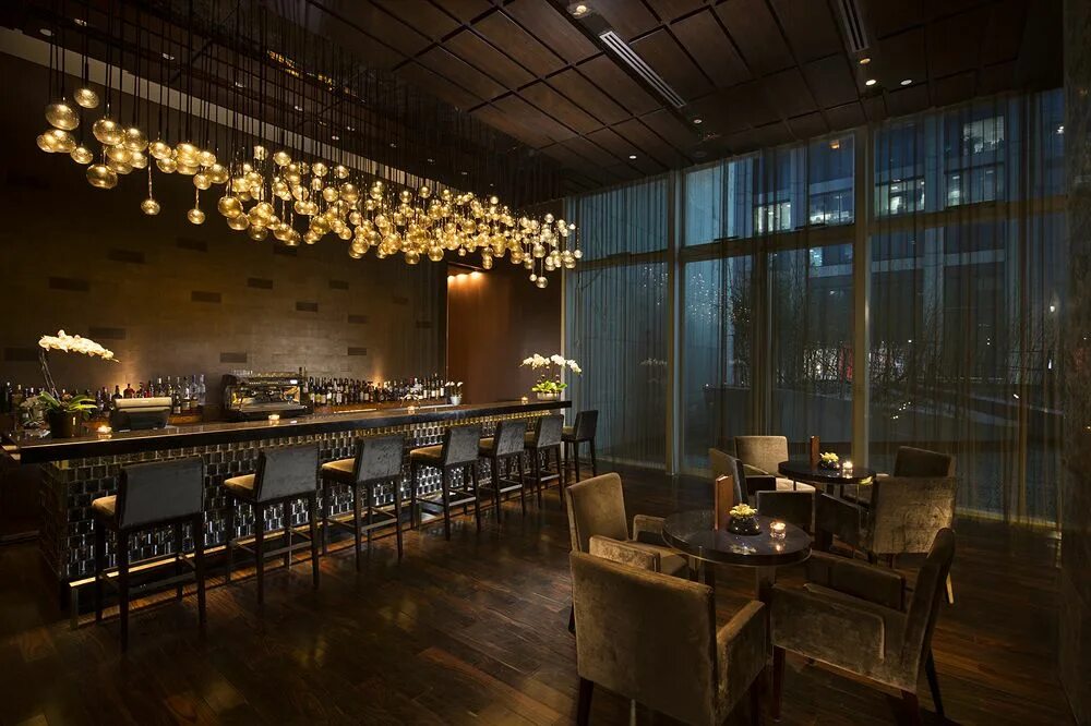 Освещение в баре фото Новый отель Conrad Beijing в Пекине BURO.
