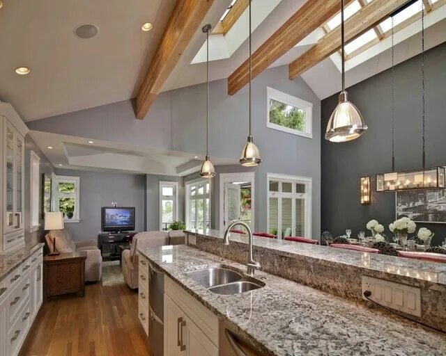 Освещение в частном доме внутри фото Exposed beams, skylights, vaulted ceiling kitchen. Vaulted ceiling living room, 