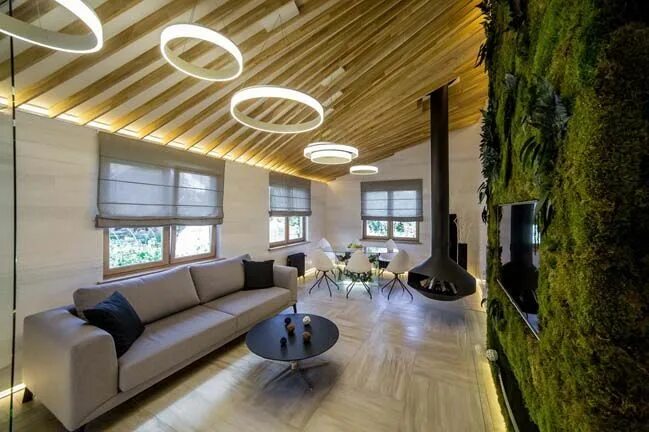 Освещение в дачном доме фото Living room interior with glass and green wall Beautiful living rooms, Living ro