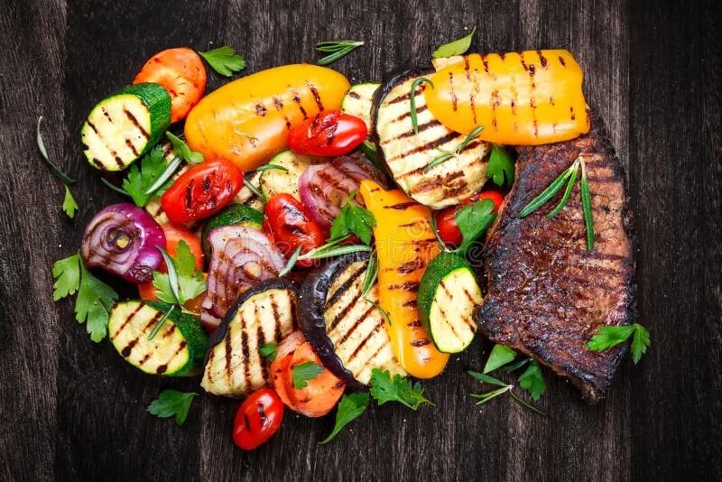Овощи на электрогриле фото Beef Steak and Grilled Vegetables. on Cutting Dark Board Background Stock Photo 