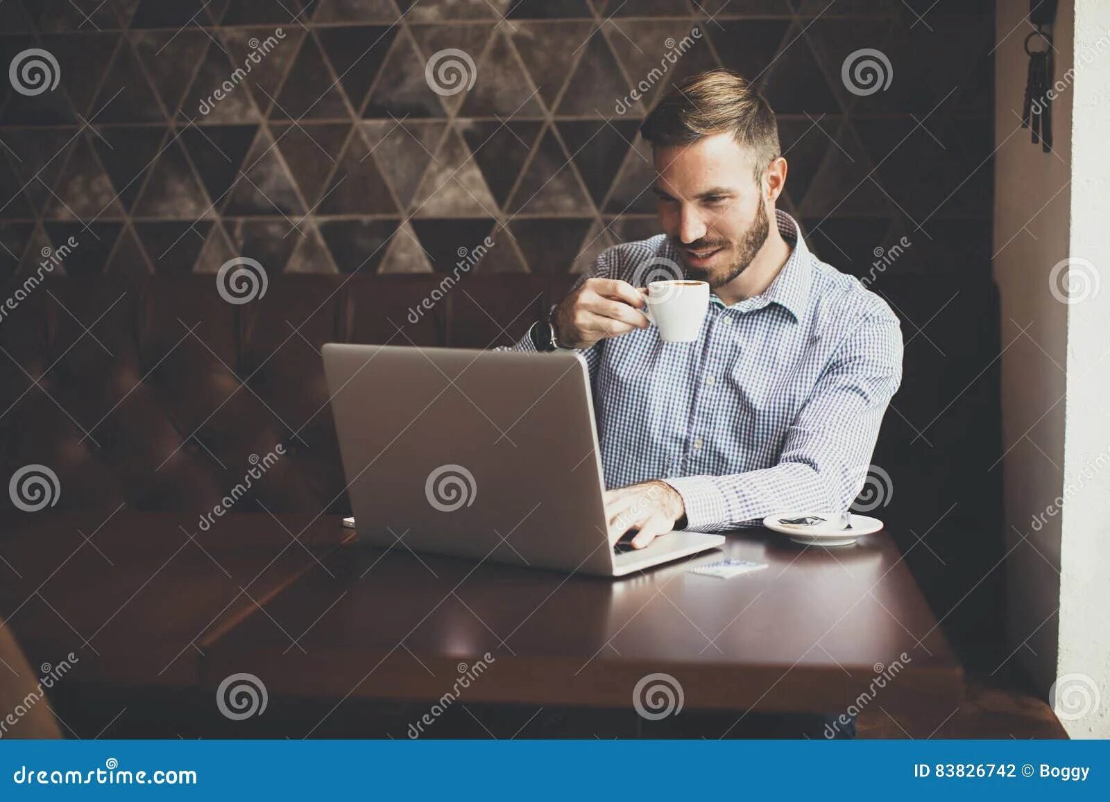 Парни с ноутбуком фото Young man drinking coffee stock photo. Image of table - 83826742