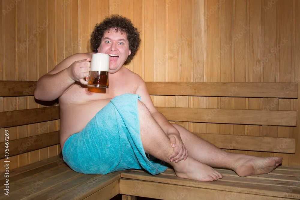 Парню девушку в бане фото Funny fat man in a sauna with a beer. фотография Stock Adobe Stock