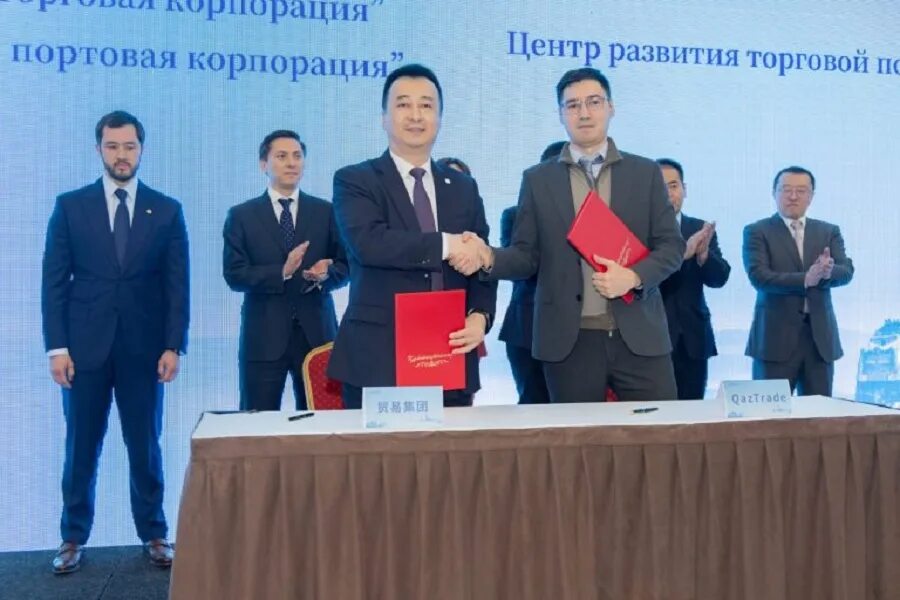 Переводчик китай каз фото QazTrade и Китайская портовая корпорация подписали соглашение о сотрудничестве