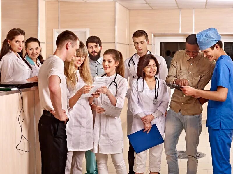 Персонал больницы фото Group Doctors at Reception in Hospital. Stock Image - Image of professional, exp