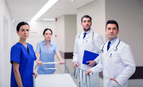 Персонал больницы фото group of doctors with gurney at hospital by dolgachov on PhotoDune. clinic, prof