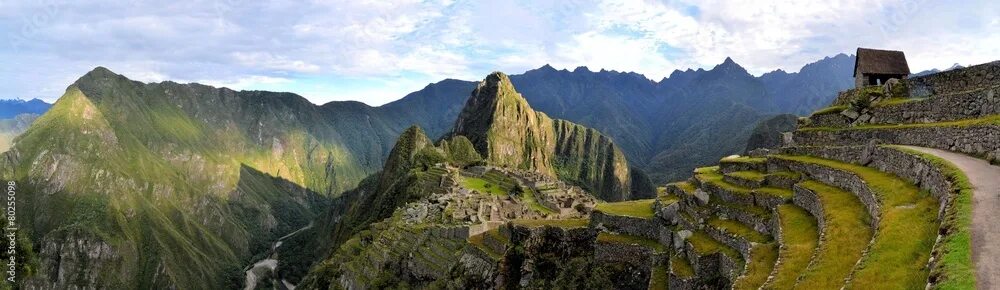 Перу фото природы Panorama of Machu Picchu, lost Inca city in the Andes, Peru фотография Stock Ado