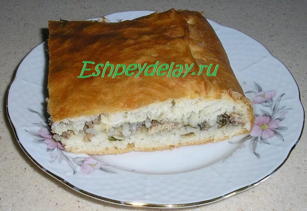 Пирог с рисом и консервой фото Пирог с рисом и рыбными консервами - рецепт с фото