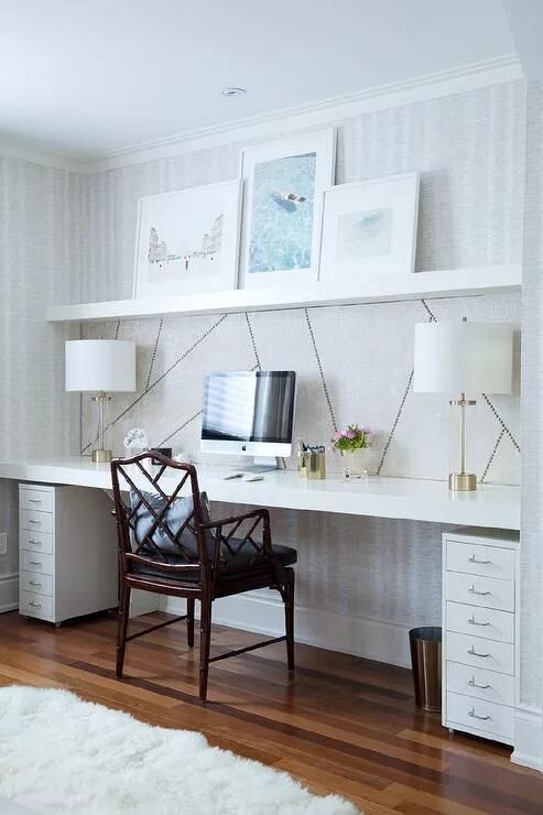 Письменный стол в комнату фото Chic home office features a wall clad in Thibaut Ikat Wallpaper lined with a wal