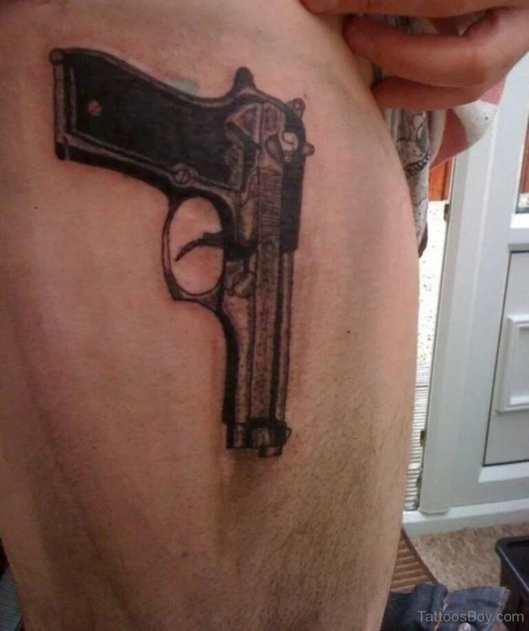 Пистолеты тату фото Gun Tattoo Design On Leg - Tattoos Designs