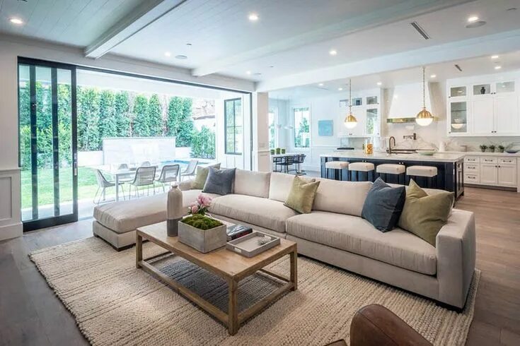 Планировки гостиной в доме Transitional Open Concept Living Room with Wainscoting and Kitchen