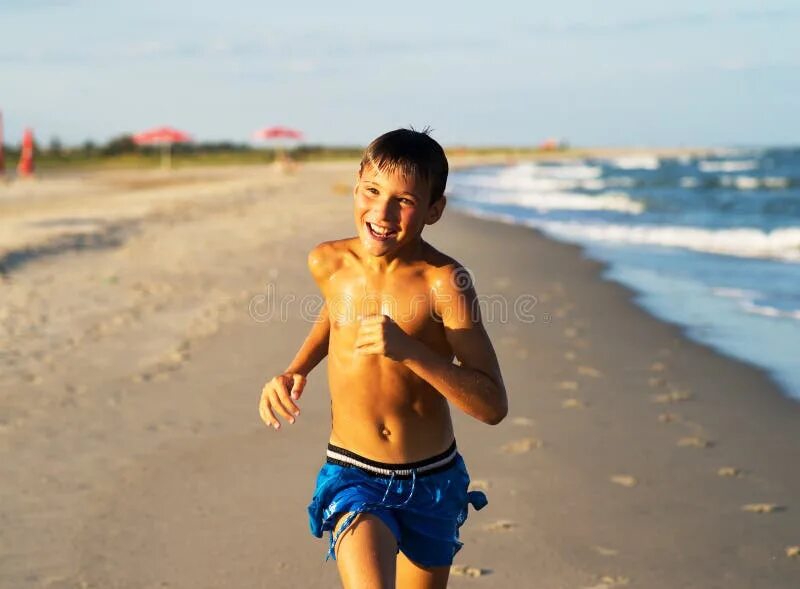 Подростки мальчики фото пляж Happy Boy Running on the Sea Beach at Summer. Stock Image - Image of beautiful, 