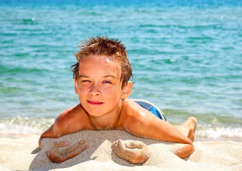 Подростки мальчики фото пляж Boy on a beach stock photo. Image of sand, enjoying, cute - 38050924