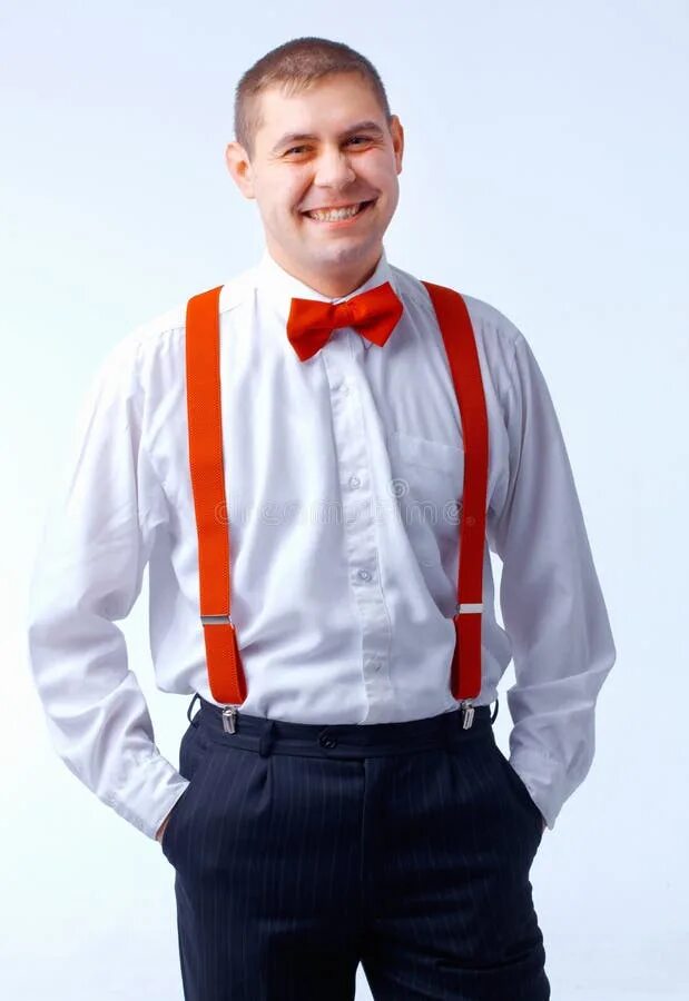 Подтяжки и бабочка фото Man with Red Bow Tie and Brases Stock Photo - Image of face, male: 19728564