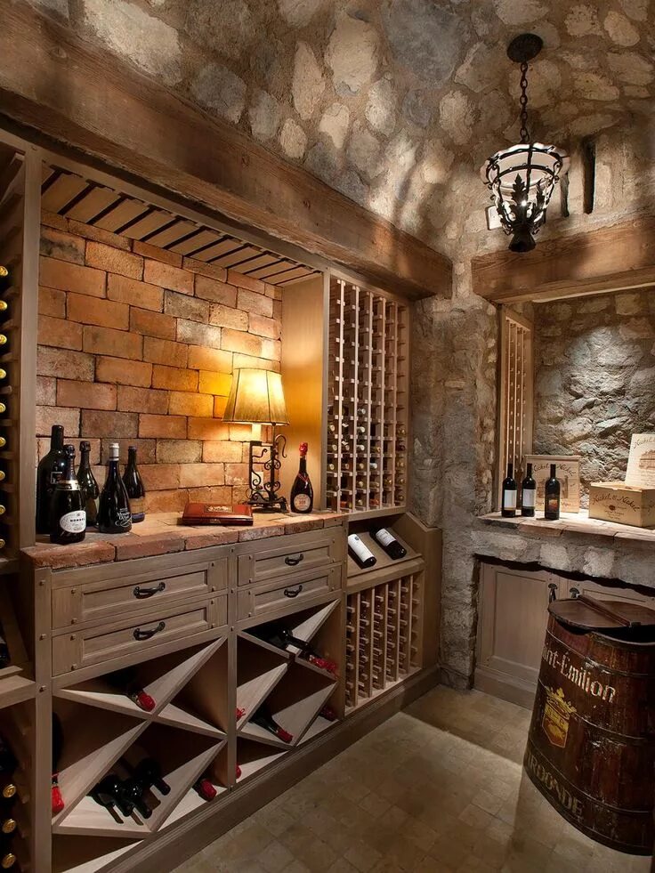 Подвал дома дизайн Rustic Stone Cellar with Neutral Wood Wine Rack Home wine cellars, Wine room des