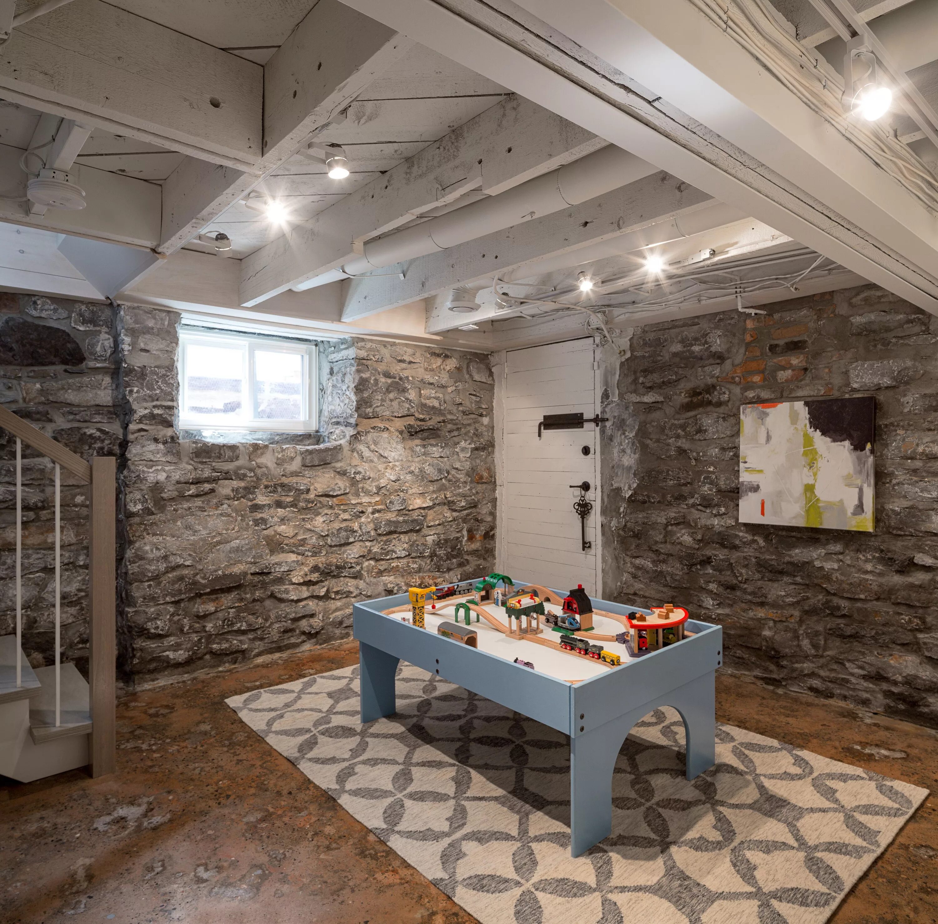 Подвал стиле лофт Stone wall basement playroom Basement design, Loft style, Basement renovations