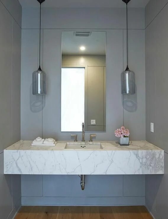 Подвесная ванна фото Contemporary gray powder room boasts walls painted gray lined with a floating ma