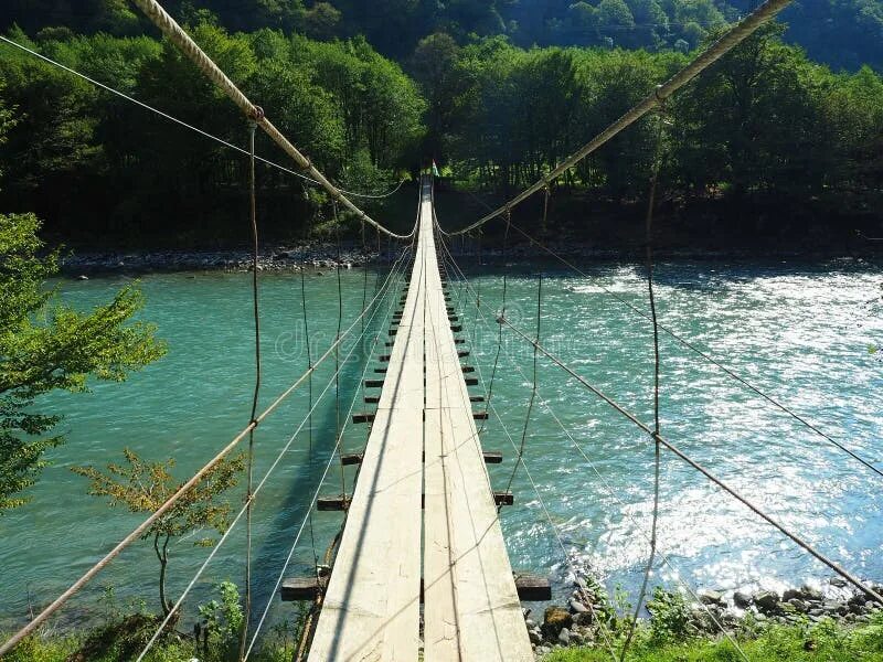 Подвесной мост река бзыбь фото Suspension Bridge Over a Mountain River in Abkhazia. Bridge in a Mountainous Are