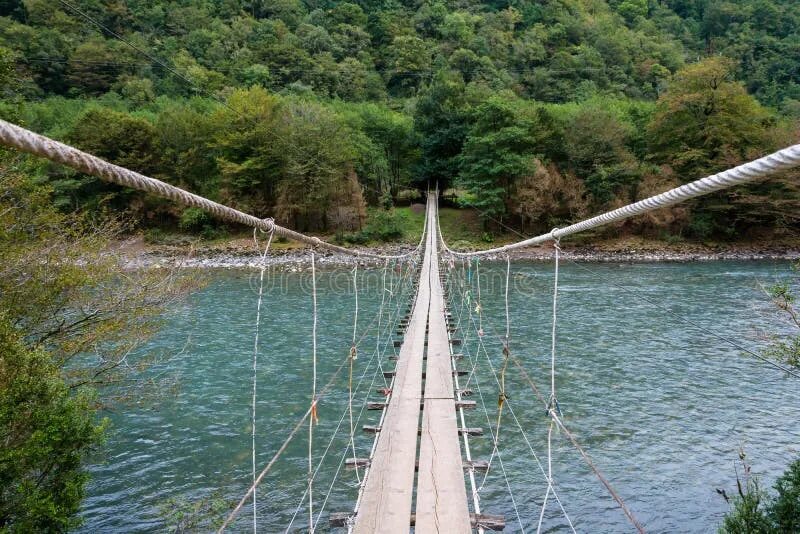 Подвесной мост река бзыбь фото Suspension Bridge Across the River Bzipi, Abkhazia. Stock Photo - Image of cross