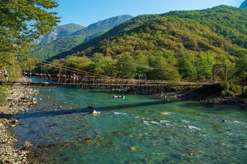 Подвесной мост река бзыбь фото Suspension Bridge Over the Mountain River Bzyb Stock Image - Image of mountain, 