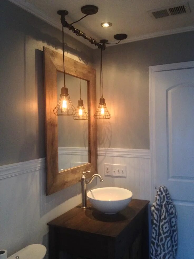 Подвесные светильники в ванной фото Vintage reclaimed wood mirror and vanity with industrial lighting; rustic renova