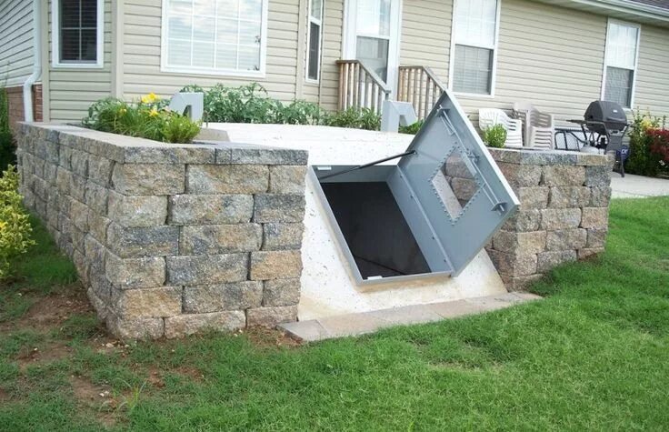 Погреб в земле фото How to Build An Underground Cellar: All You Need to Know Underground storm shelt