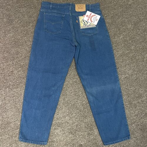 Покажи фото джинс Vintage 90s Levi’s 550 Denim Orange Tab Jeans Size 38x30 Faded NOS NWT Deadstock