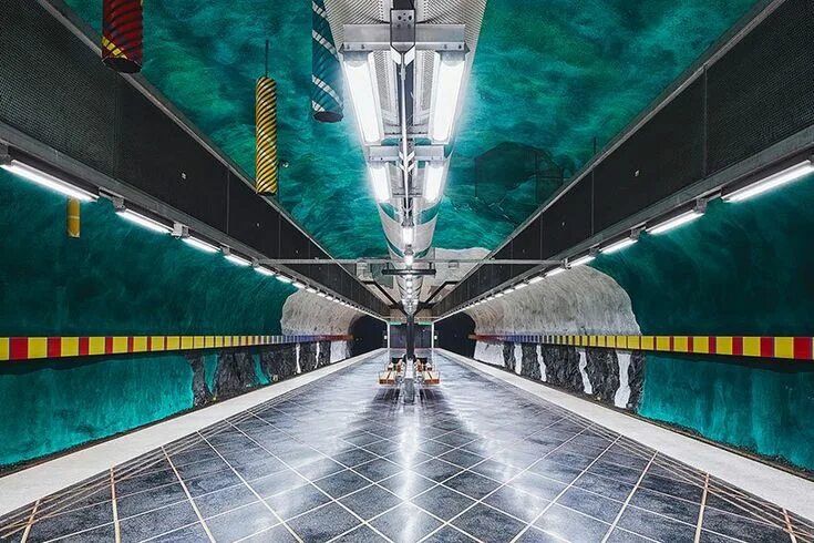 Покажи фото метро david altrath captures the lively artworks of stockholm's underground metro stat