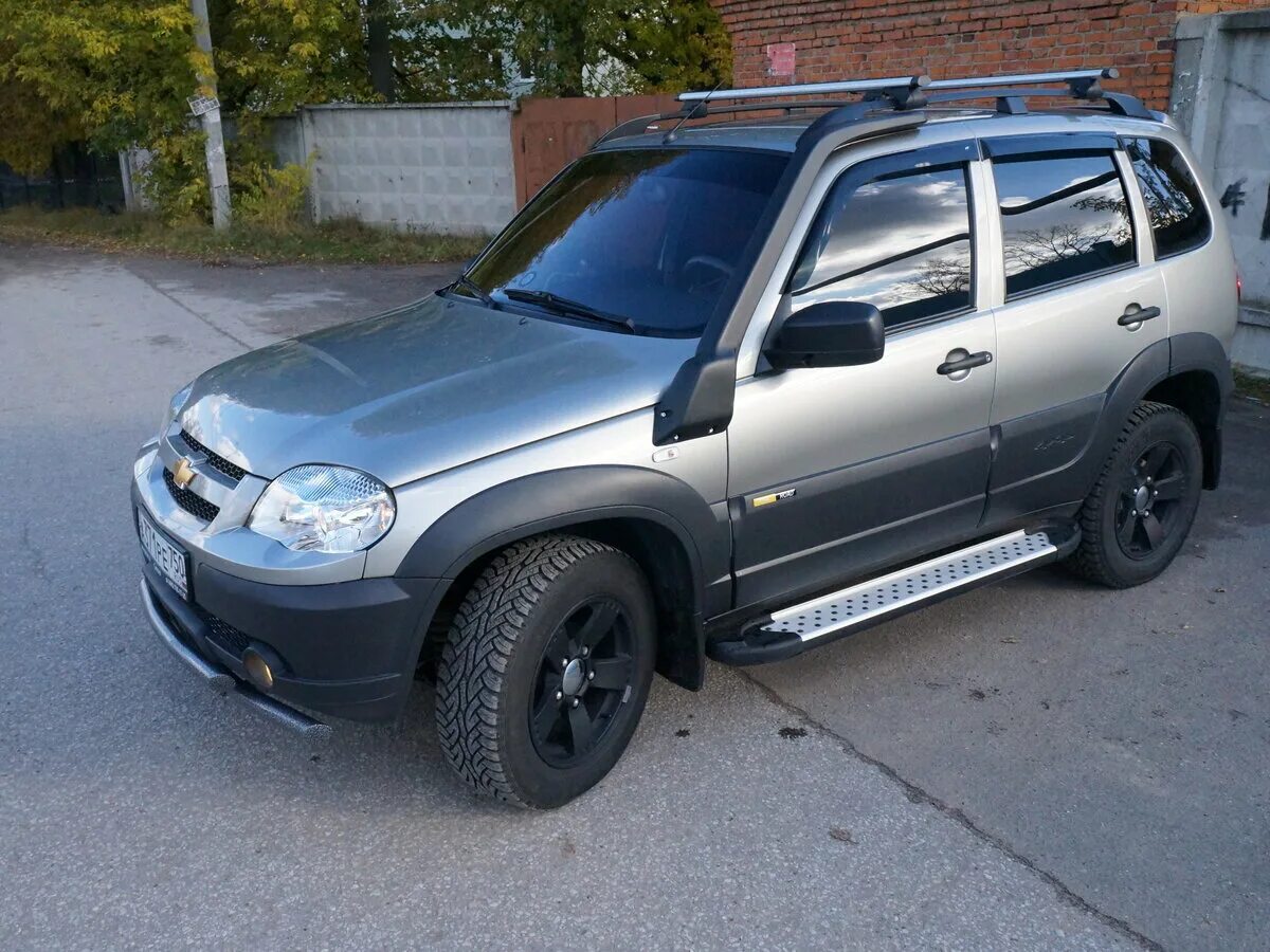 Покажи фото нива шевроле Купить б/у Chevrolet Niva I Рестайлинг 1.7 MT (80 л.с.) 4WD бензин механика в Се