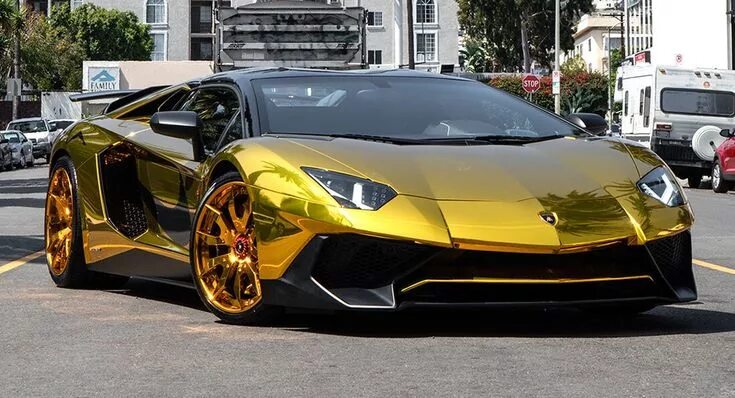 Покажи фото самых крутых машин Chris Brown's Aventador SV Roadster Shines With Gold Chrome Wrap, Forgiato Wheel