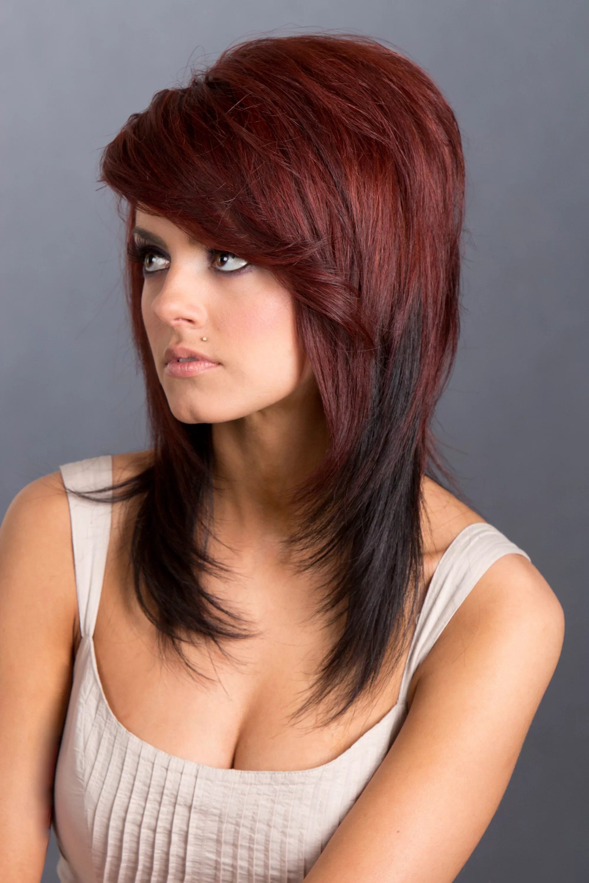 Покажи стрижки на длинный волос Medium length hair from red into brunette with layers and sweeping bangs by Sigg