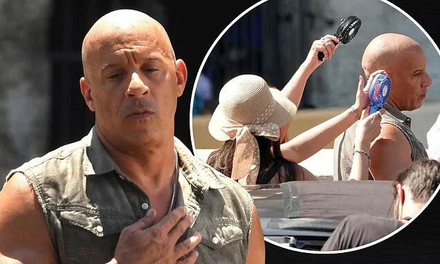 Пол и вин дизель фото Vin Diesel is cooled down by fan waving assistants while filming Fast X in swelt