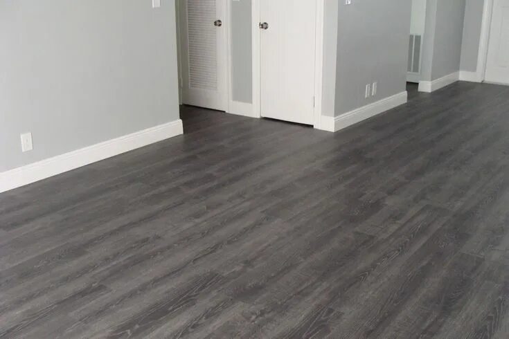 Пол серого цвета фото Tokyo Oak Grey Laminate (All rooms, minus the bathroom s). Grey laminate floorin