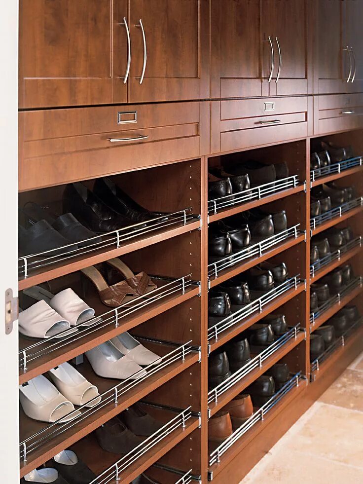 Полки для обуви в шкафу фото Shoe racks with a metal ledge to prevent them from sliding out. Shoes are angled