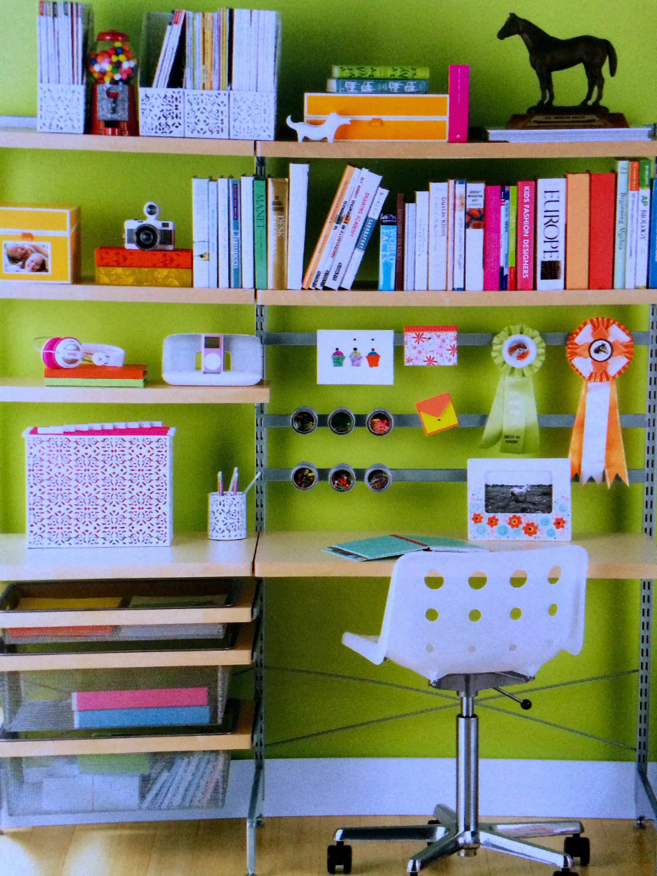 Полки для школьного стола фото Fun, happy colors and a painted wall liven up any student work area Kids storage