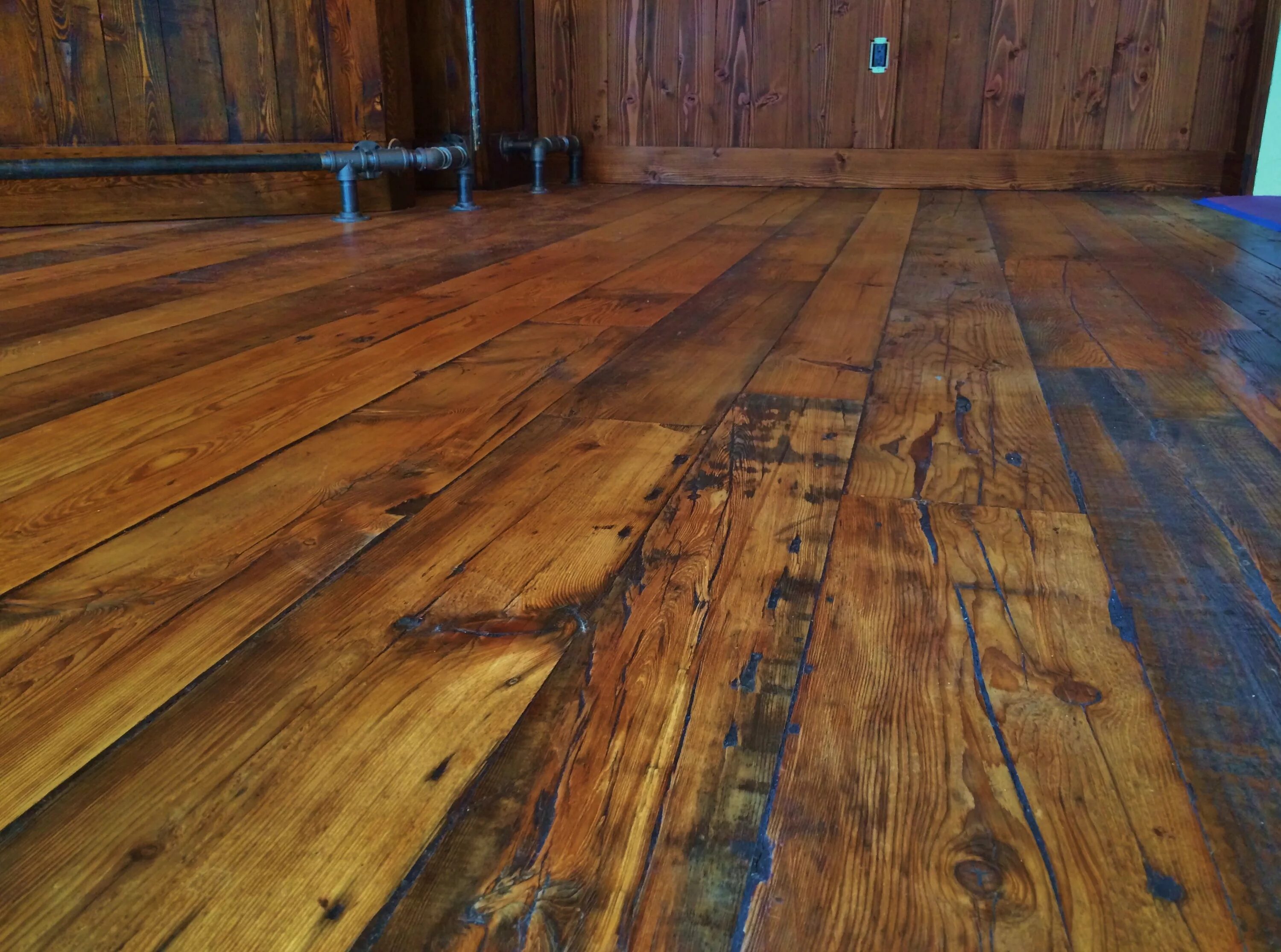 Полы дерево фото #Reclaimed wide plank #hemlock in a customer's bar area. Douglas fir wainscoting