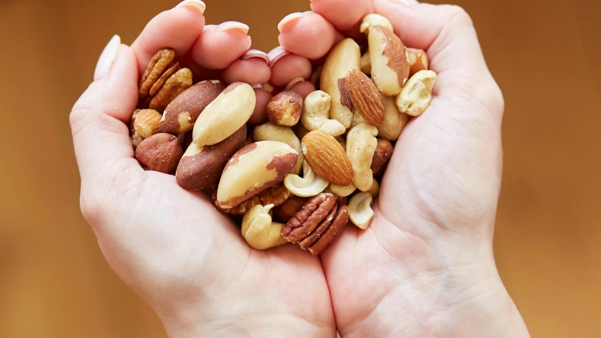 Польза орехов фото Eating nuts regularly could prevent heart disease, research claims The Sun