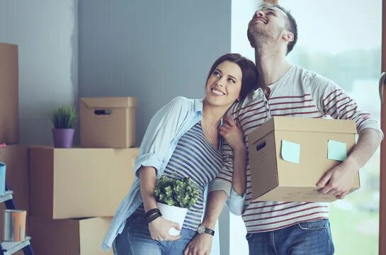 Помощь оформлении покупки квартиры Young Couple Moving To New Home Handsome Man Smiling Moving Cardboard Box Зображ