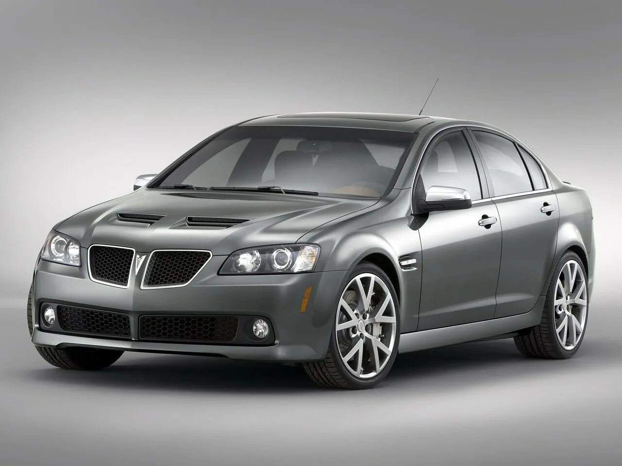 Понтиак спорт фото Сравнение Pontiac G8 и Pontiac G8 GXP по характеристикам, стоимости покупки и об